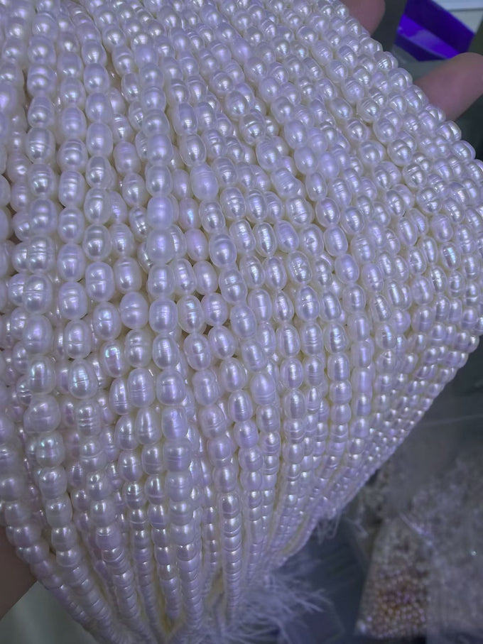 6-7mm white ribbed freshwater rice pearl strands